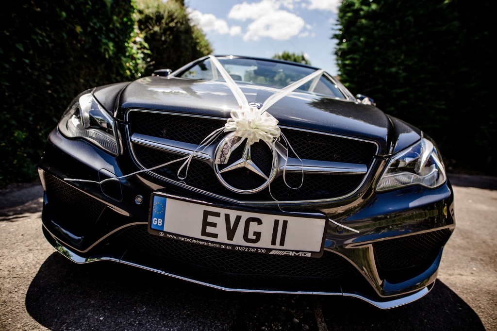 Black Mercedes wedding car with wedding bow decoration white colour Maidstone wedding